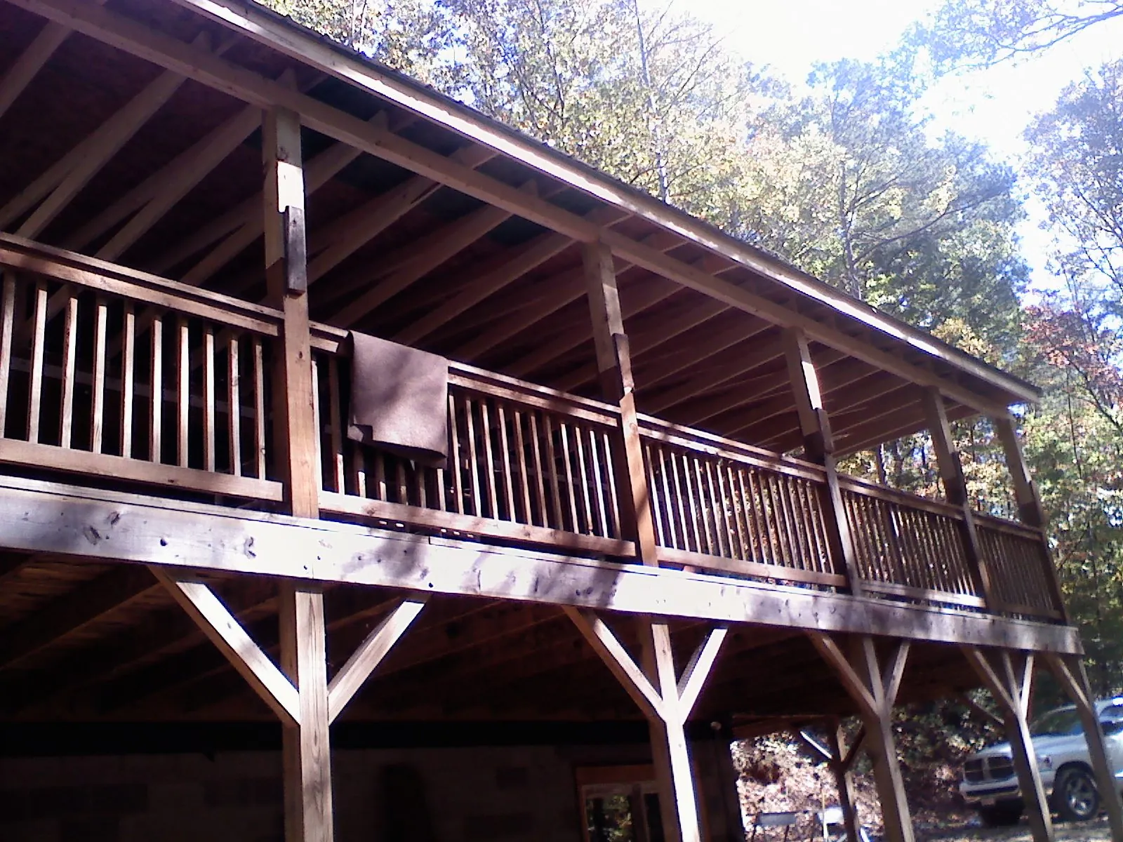 Timber framing under a new elevated porch and deck — Roof Leak Repair in Spencerport by Roofing Brothers